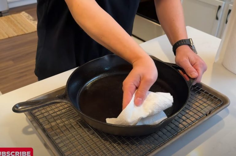 To clean a cast iron griddle, scrub it with hot water and a stiff brush, then dry and oil it. Avoid using soap or steel wool, which can damage the seasoning.